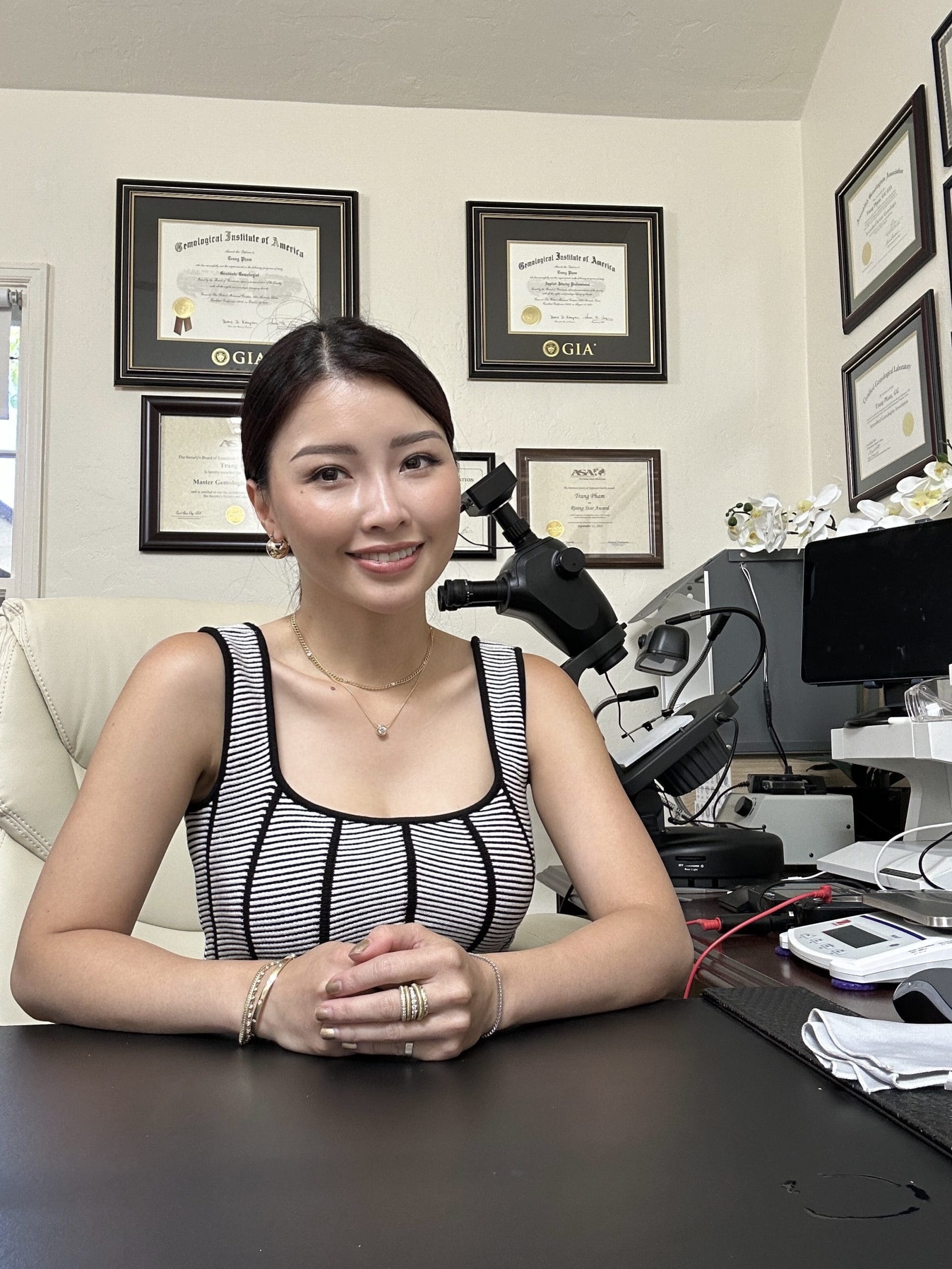 A professional independent jewelry appraiser and broker in her office in San Diego